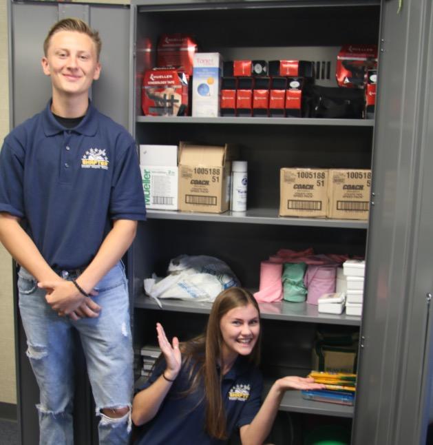 Students and their supply closet.