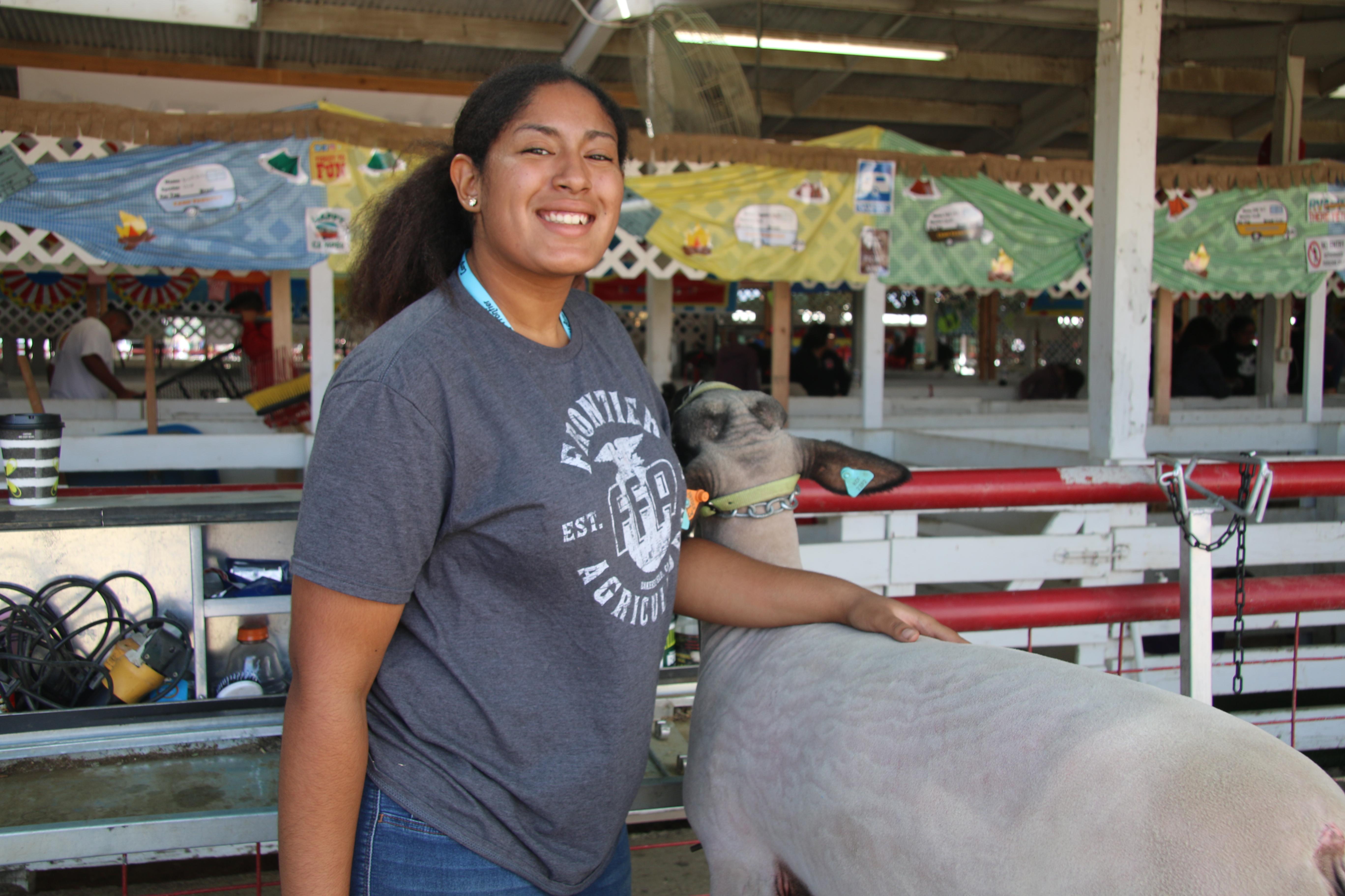 Frontier FFA student with lamb