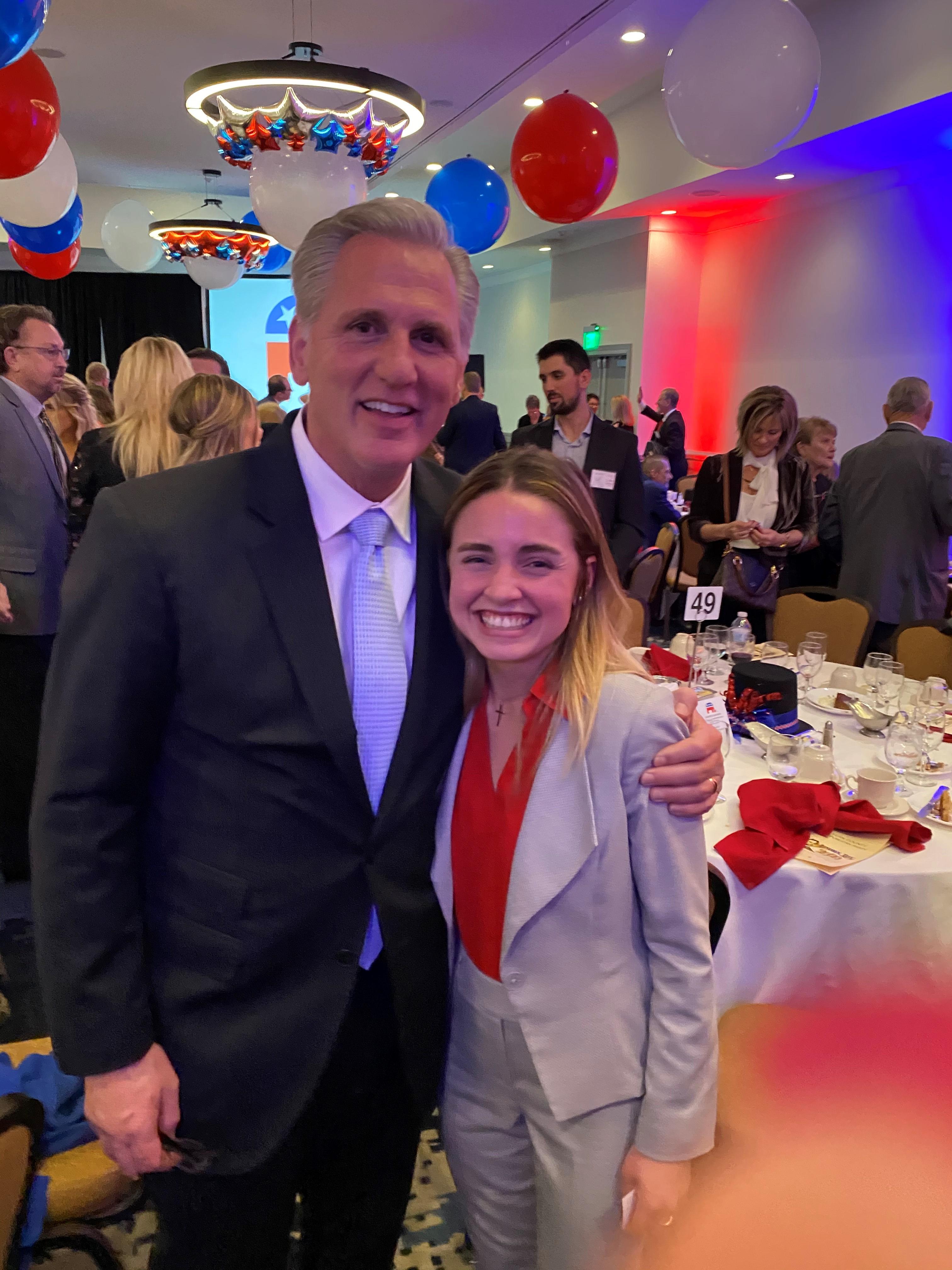 student poses for picture with Congressman Kevin McCarthy.